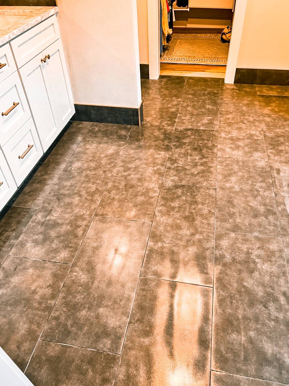 new gray tile for a bathroom, brick pattern, stone-like look.