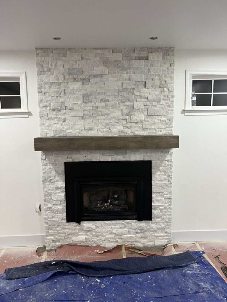 Stone fireplace surround tile detail