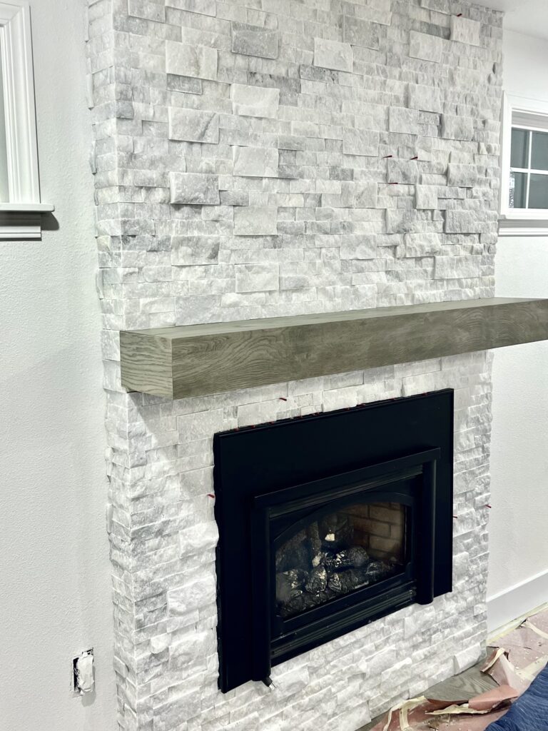 Stone fireplace tile surround
