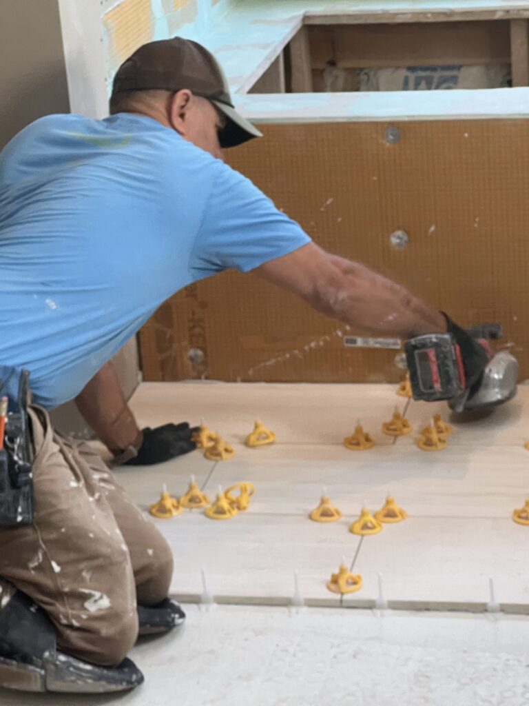 Walk-in shower renovation tile walls and floor