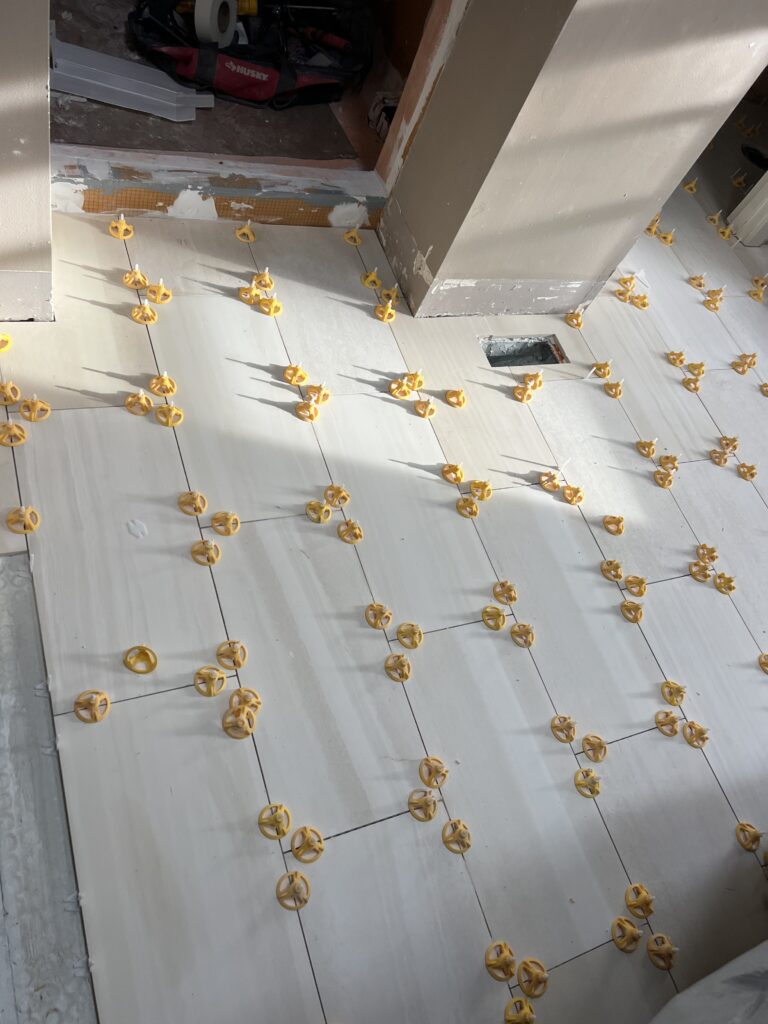 Large-format floor tile finished room