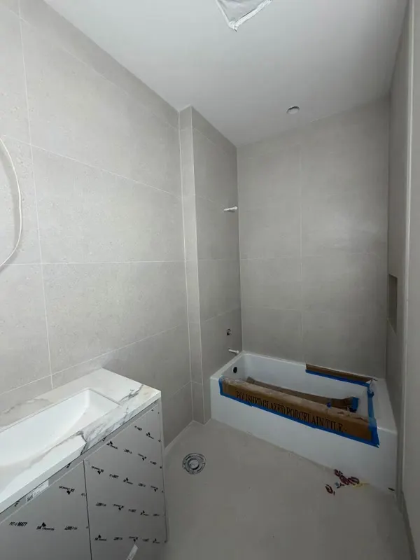 Bathroom remodel progress in Issaquah — tile layout and finish work