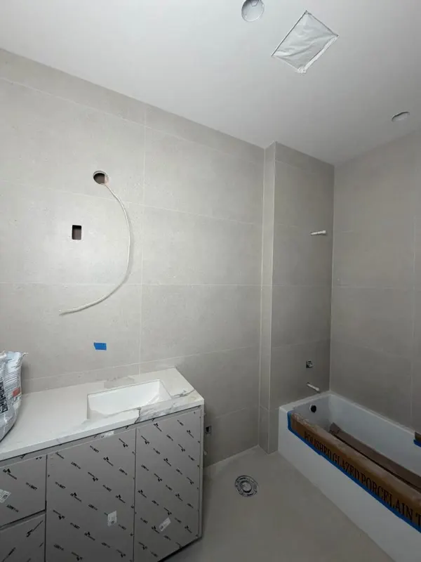 Large-format tile work during a bathroom remodel in Issaquah
