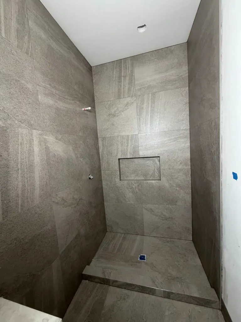 Bathroom floor tile install underway in Issaquah