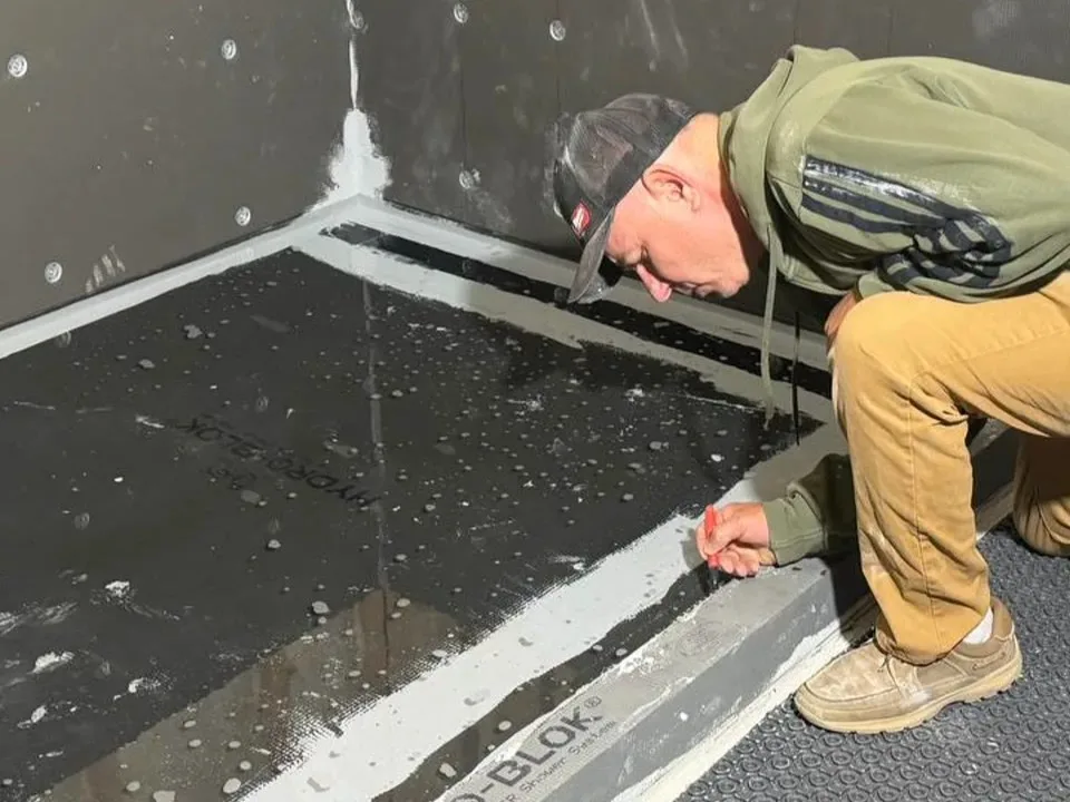 Andzhei on a bathroom remodel job in Medina