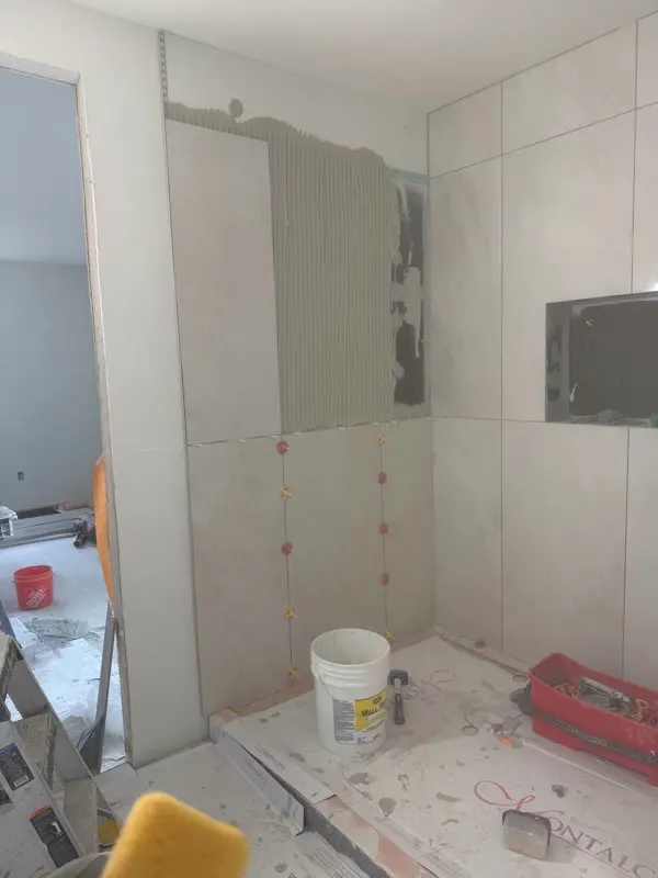 Bathroom remodel progress in Mercer Island — tile layout and finish work