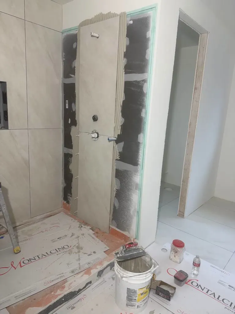 Bathroom floor tile install underway in Mercer Island