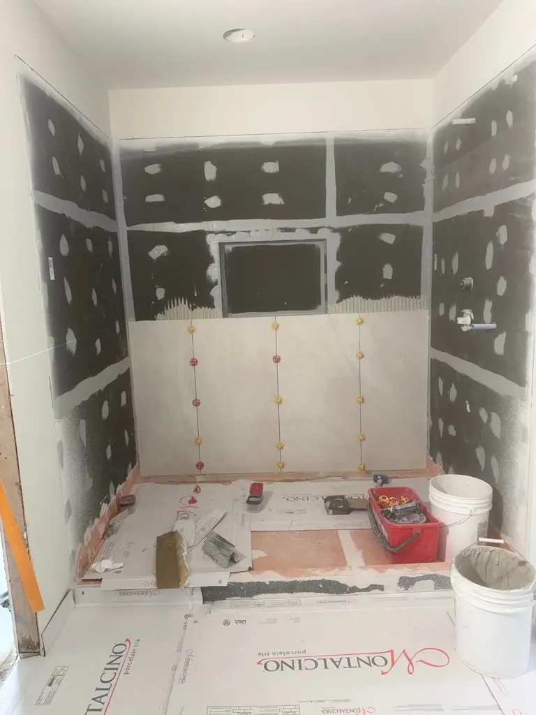 Waterproofing and curb work before tile in Mercer Island