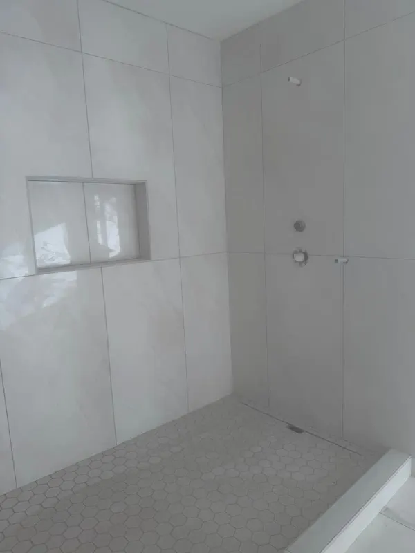 Shower tile install in progress for a bathroom remodel in Redmond