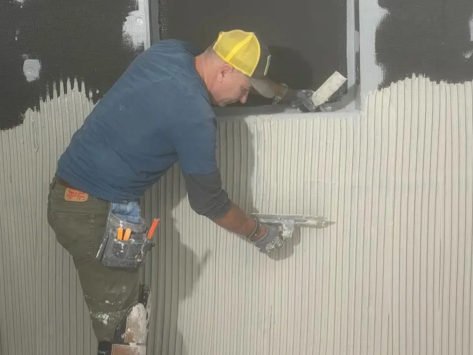 Andzhei on a bathroom remodel job in Redmond