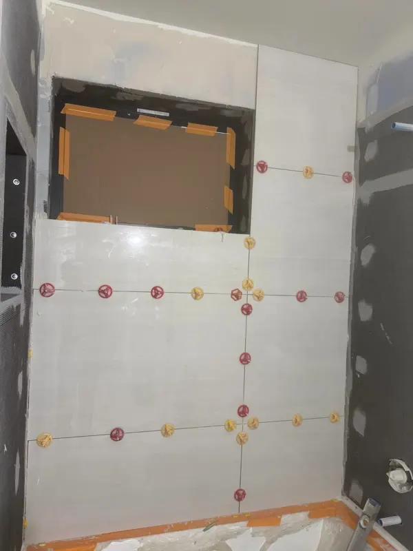Shower tile install in progress for a bathroom remodel in Snohomish